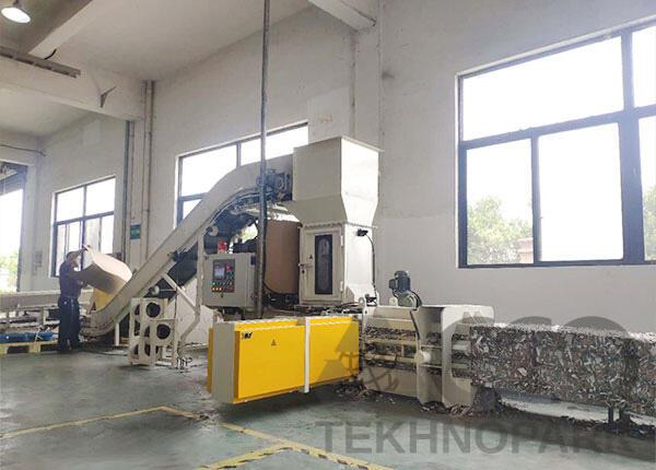 Compact press with aspirationsystem